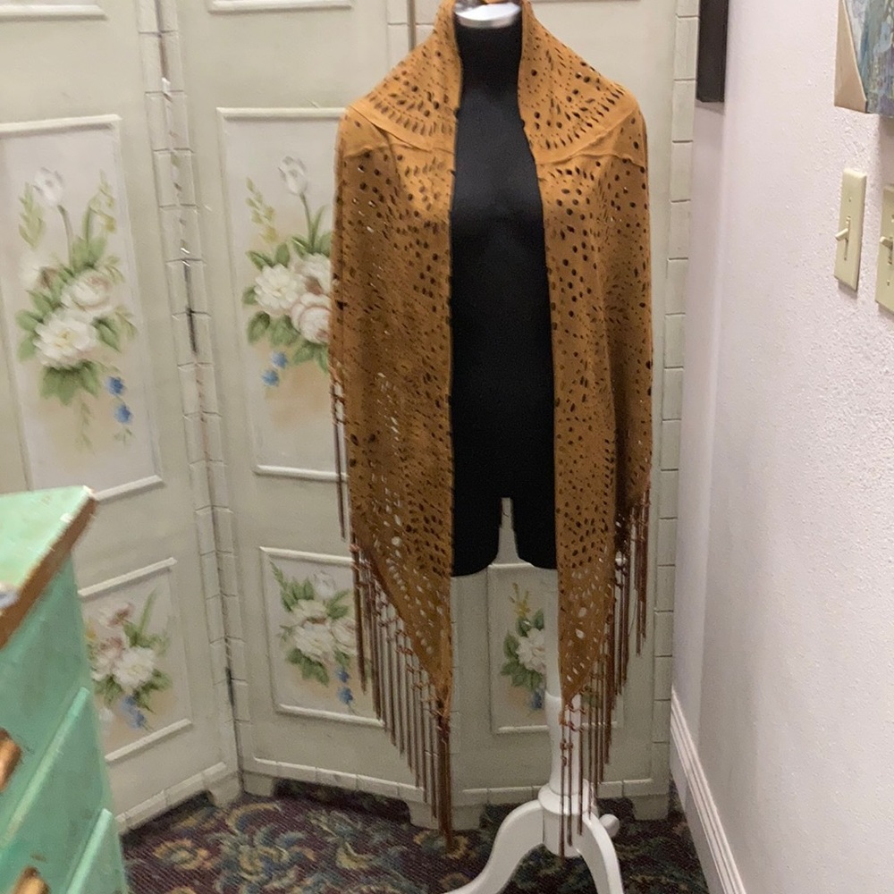 This is a faux suede wrap by 2 chic lux